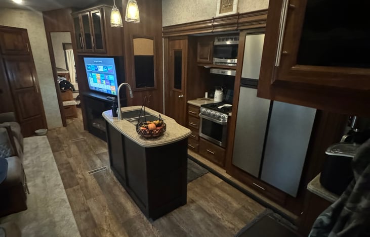 large living area and kitchen with island