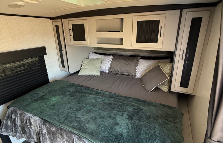King size bed with foam topper