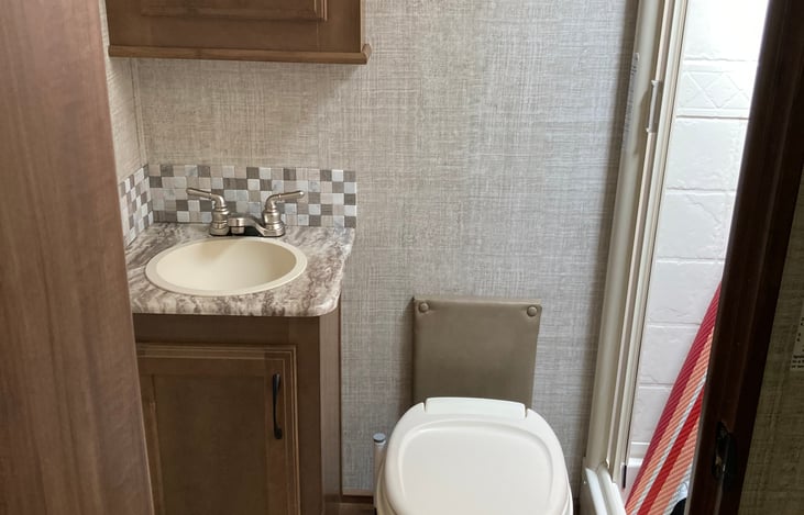 Nice size potty and shower.  Plenty of room to take care of business!!!