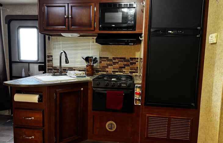 Added-kitchen towels, fully stock with pots/pans, coffee cups, cups, plates, bowls, utensil sets, and grilling sets, coffee maker, toaster, and plenty more.