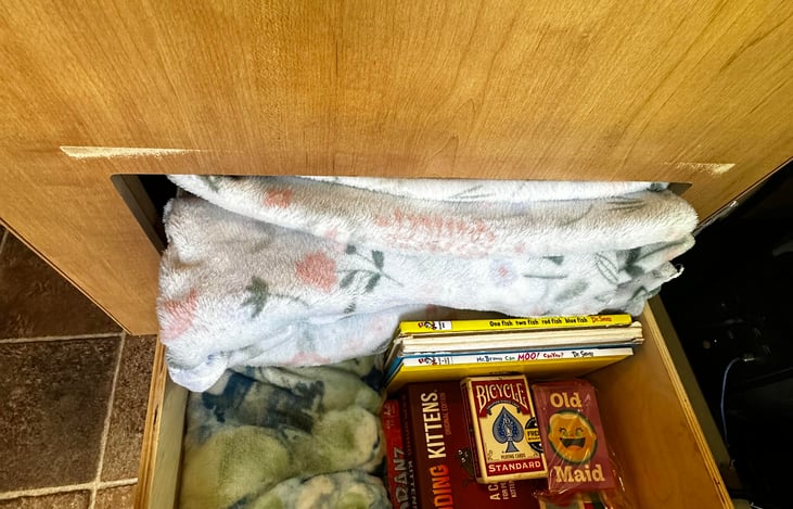 Games/books/blankets for use.