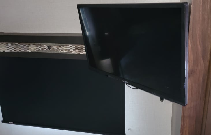 Privacy shades and mounted 20in smart tv