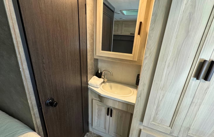 Wash sink, hand soap included.