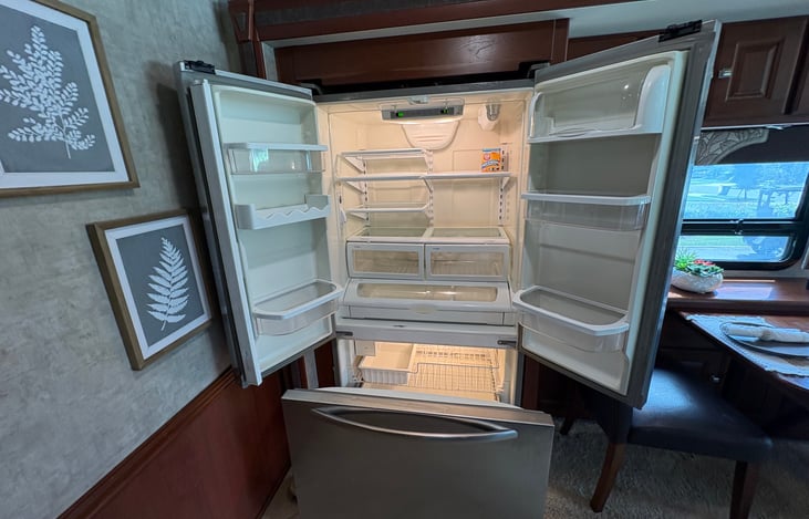 full size refrigerator and freezer (doesn't have an ice maker or water so we just get a bag of ice and get bottled water as needed)