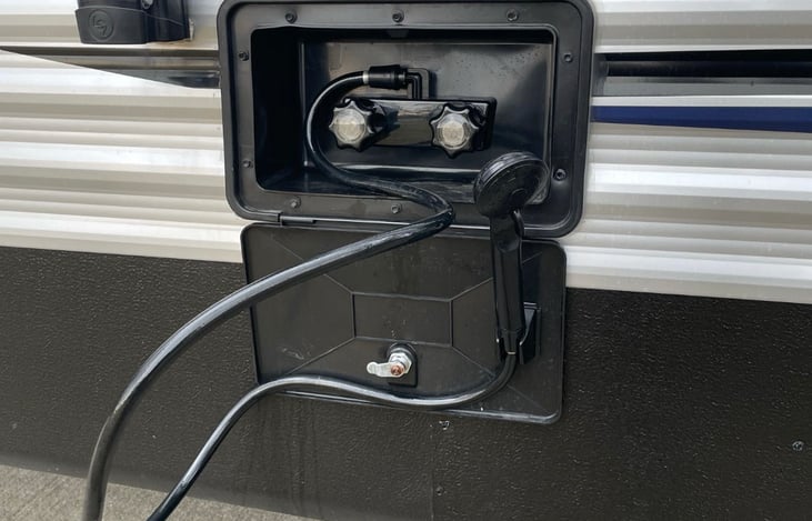 Outdoor shower for messy moments