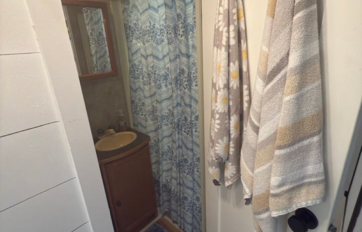 Full bathroom with a tub and shower.