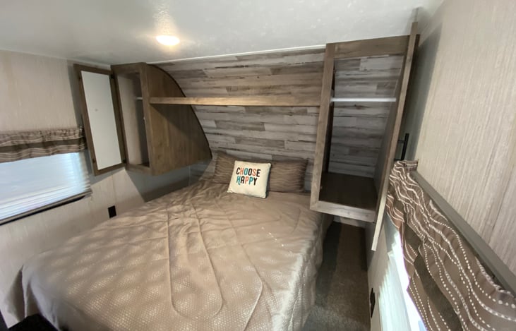 Master bedroom with open closets