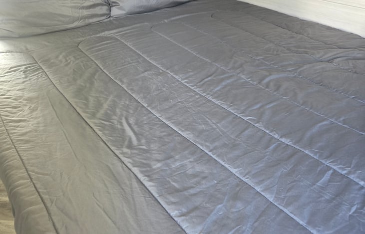 Front queen bed folded out from coach position