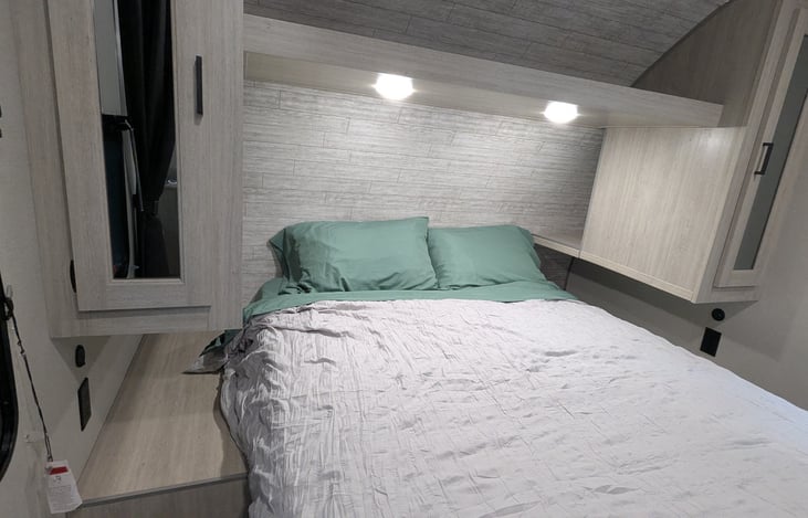 Private front bedroom with queen bed.