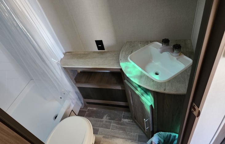 Bathroom cabinet storage space.