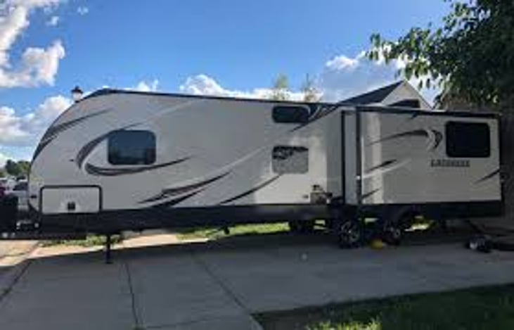 Left side with app out where the living room recliners are.