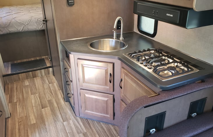 Kitchen sink and propane stove top!