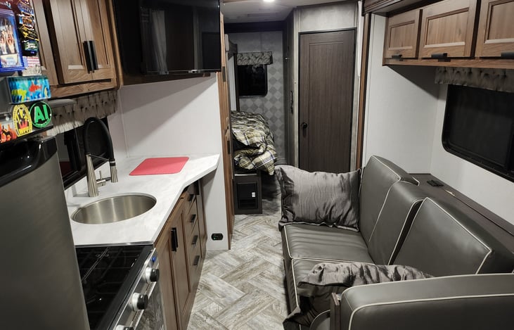 Main cabin rear, slide in, ready to roll. Can still access everything including the bathroom.