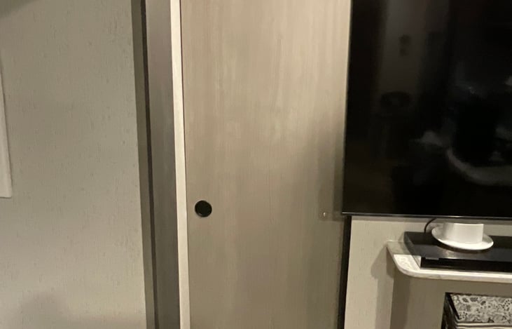 Door to master left side.