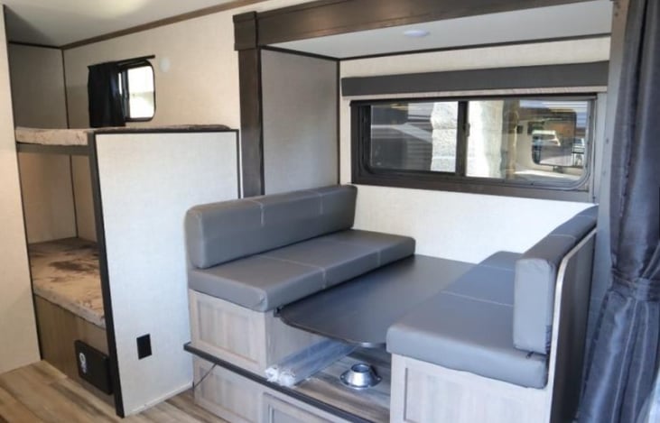 Dining room table converts to a twin size bed for that added little guest.  Bunk Beds ensure that the little ones have their own space.