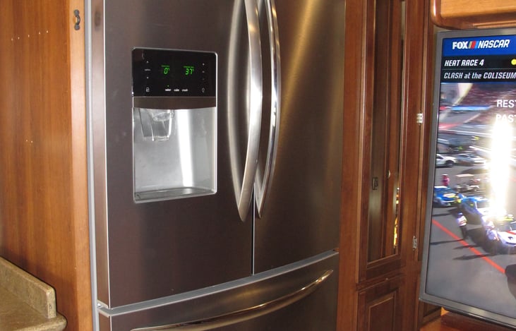 Full Size residential Frigidaire refrigerator.  Can run on batteries while traveling keeping you food and drinks cold.