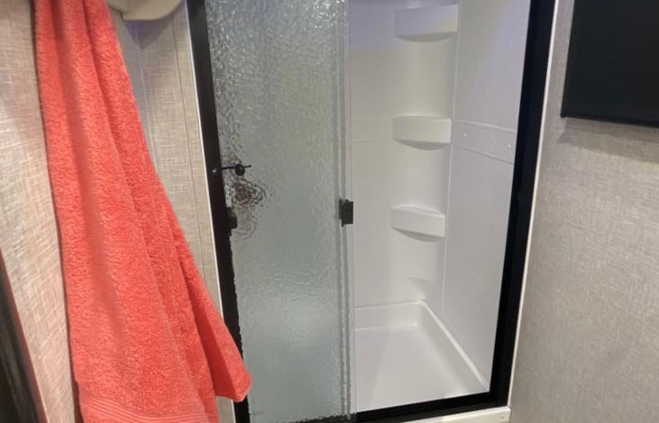 Walk in shower. Bath towels, wash cloths and soap provided