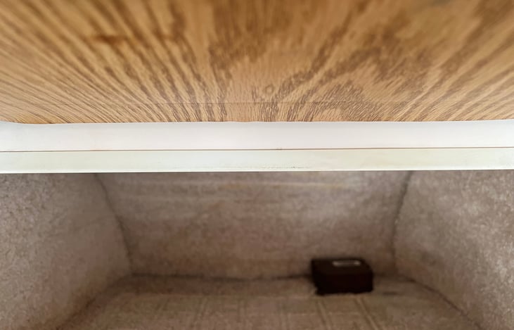 Closet above refrigerator