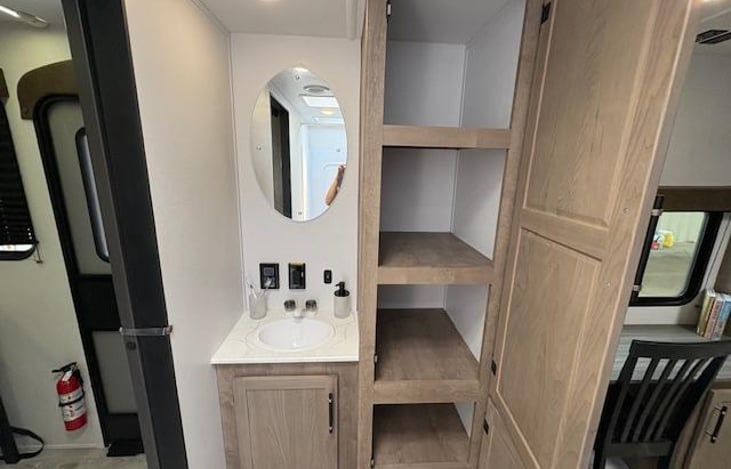 Bathroom Sink and linen closet