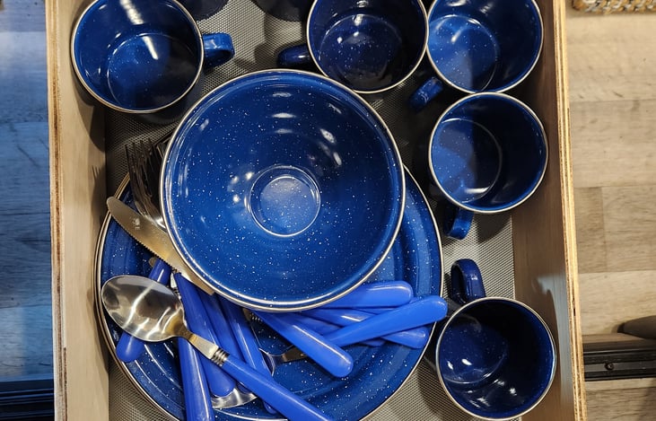 Camping grade enamel dining set included with rental (includes plates, bowls, mugs and utensils for 8).  Please note these can not be used in the microwave.