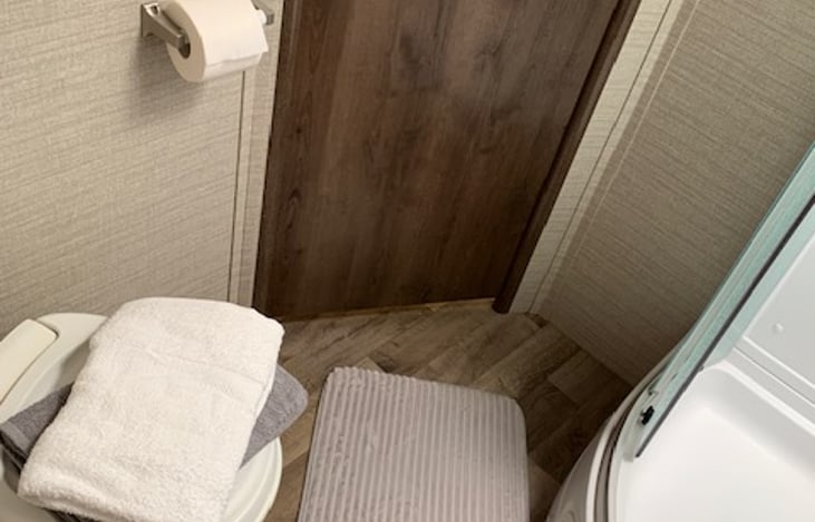 Bathroom walking area and toilet.