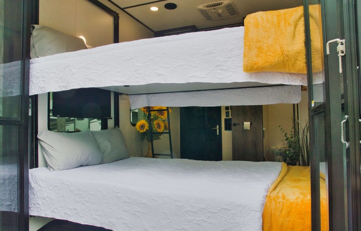 The sliding glass doors can be opened up or closed & still keep the bugs out with the screen doors.