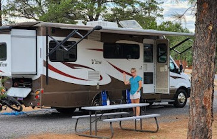 Easy to back in and park amost anywhere.  Sharp turn radius and backup camera.  2 slides make it spacious and rear trunk holds provided camping chairs.  Bike Rack & lock $50 at time of departure.