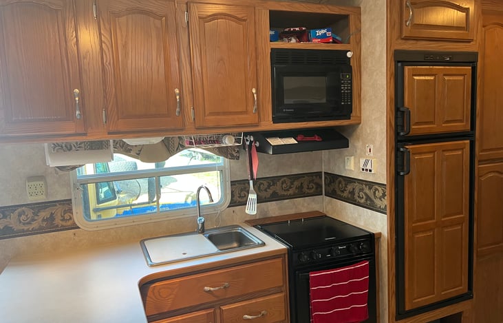 Kitchen straight across from dining booth.