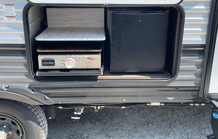 Enjoy breakfast lunch or dinner with the outdoor gas griddle and mini fridge.
