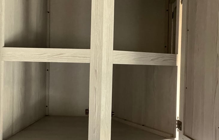 Same cupboard with pots/pans, just empty :)