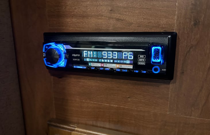 Onboard radio plays through cabin speakers as well as outdoor speakers. Has aux input to add your own music!