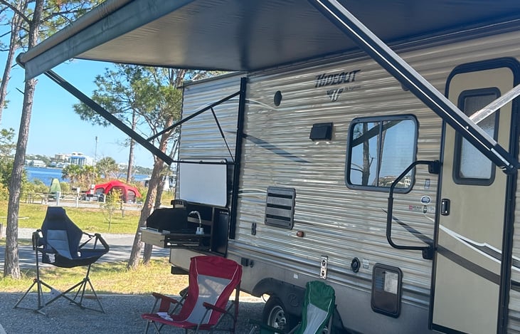 Relax under the full canopy. Fix meals outside or use the provided BBQ grill.