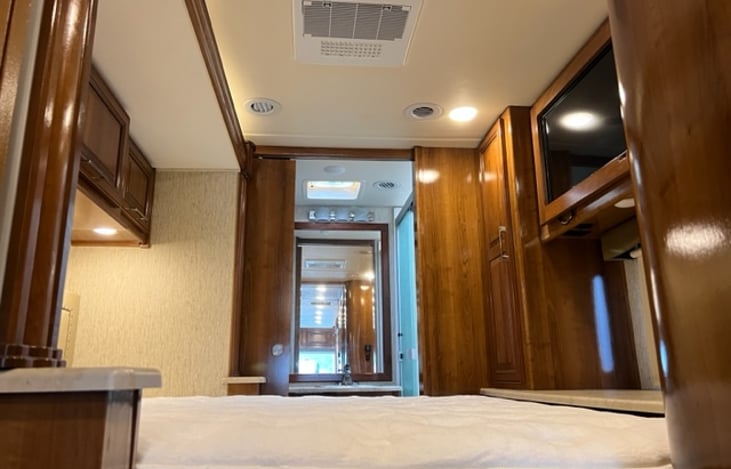 View from hallway into bedroom to Master Bath