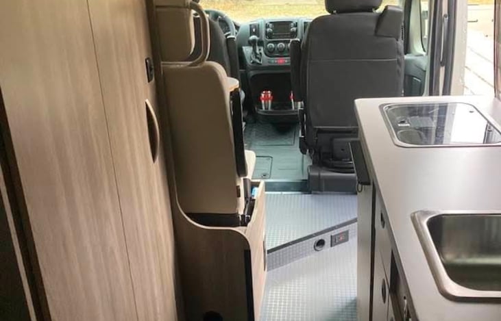 2 burner propane stove top and kitchen sink.