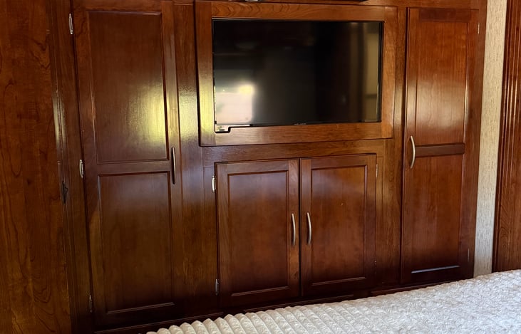 Master bedroom Entertainment center and wardrobe