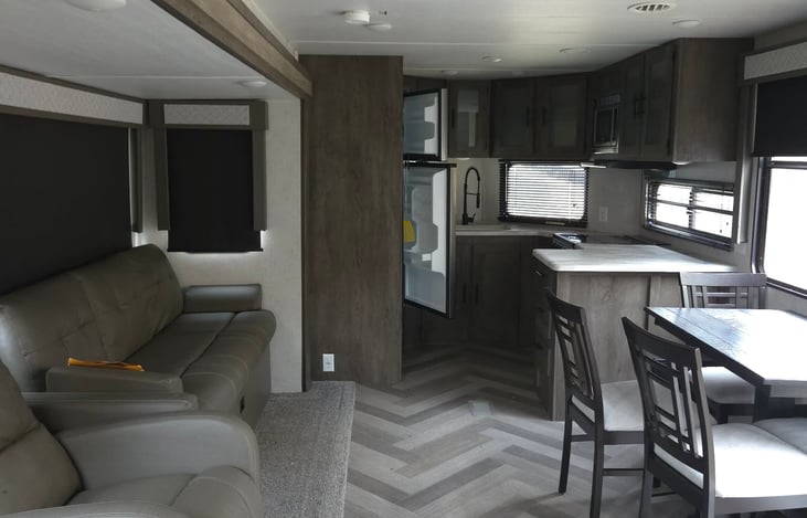 Kitchen nook, dinning room table and sleeper sofa