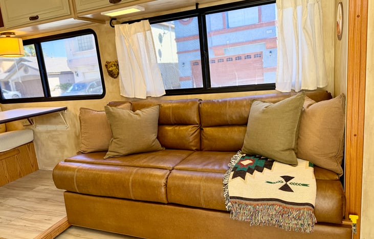 Couch lays out flat to sleep two more guests