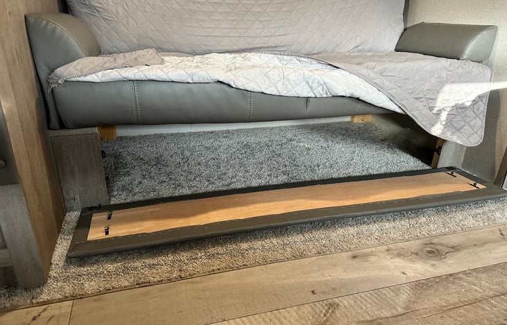 Storage under couch.