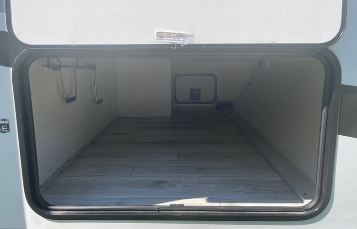 Additional storage in the front of the camper for your chairs and roasting sticks.