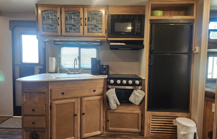 Full Kitchen with 3 burner gas stove.  Keurig coffee maker and toaster included with rental