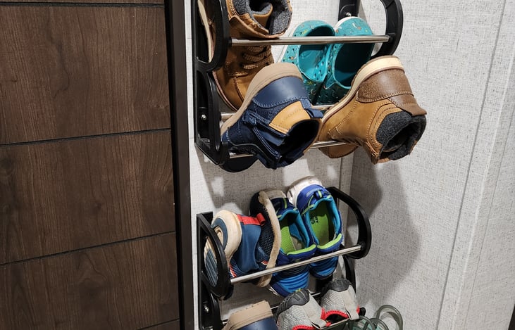 Kids bunk room shoe storage.