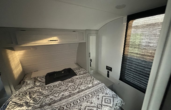 Private room with queen and two closets, overhead storage