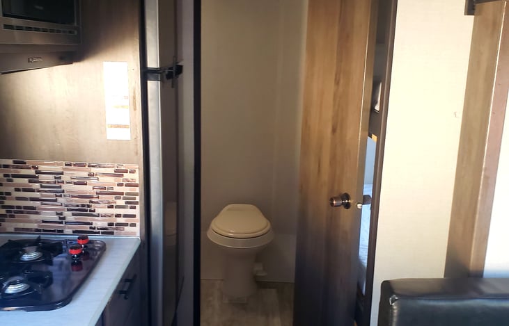Toilet and Shower all the way in the back