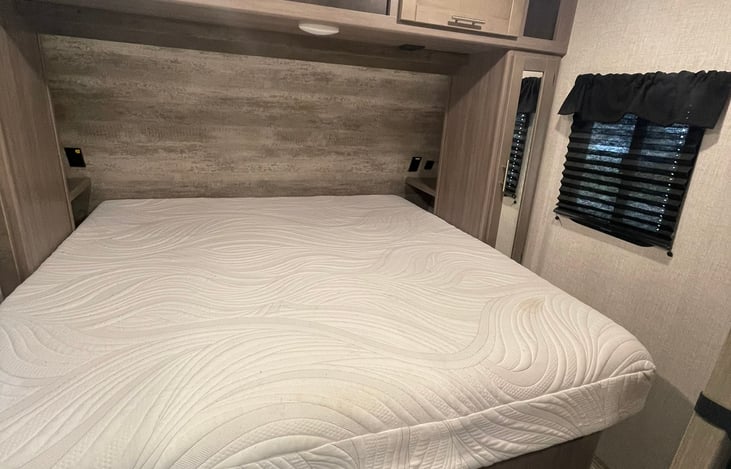 King Size bed + Storage (sides, top, underneath)