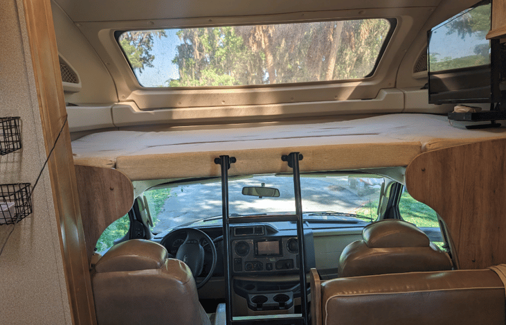 Top bunk sleeps 2 and has a TV. We have 2 littles and this was a perfect space for them to play in when we were inside.