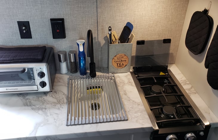 Sink area. All items shown included with rental.