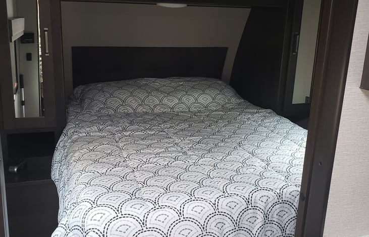 Comfortable Queen size bed.  Two wardrobe areas for plenty of storage.