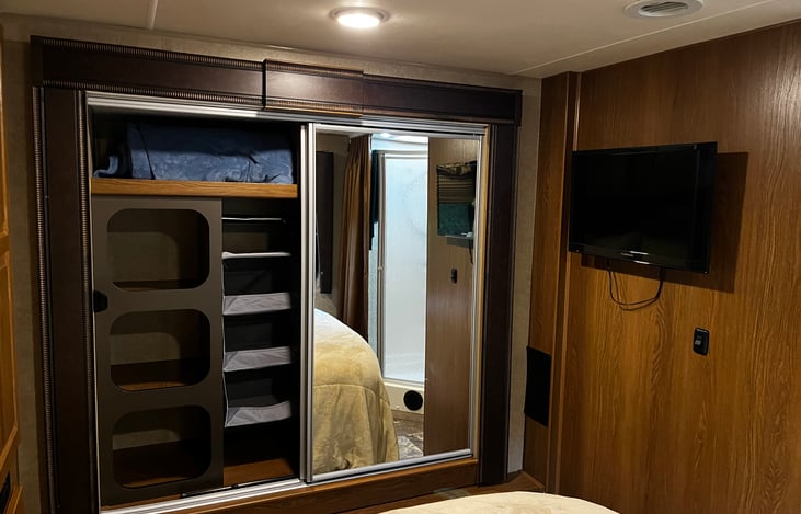 Bedroom has the 2nd slide out to make it roomy and cozy. Wall mounted TV with DVD player for indoor entertainment.