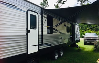 Aaron and Kim's Luxury Travel Trailer 38FT Sleeps 6 Comfortably