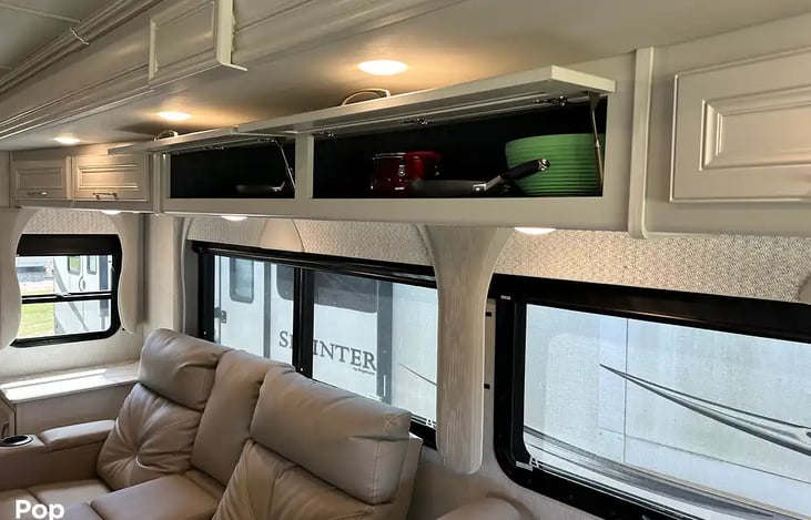 Above storage with pots, pans and kitchen items to make your stay comfortable